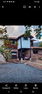 una captura de pantalla de una casa con una foto de ella en De la Montaña, en Duitama