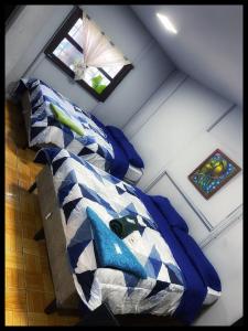 Voodi või voodid majutusasutuse Managua Hotel Oasis toas