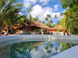 Bazén v ubytování Manoa, boutique Villas and Spa nebo v jeho okolí