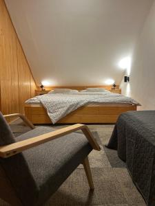 Postel nebo postele na pokoji v ubytování Domcek v strani