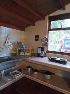 Η κουζίνα ή μικρή κουζίνα στο Alojamiento Los Alpes +2 φωτογραφίες