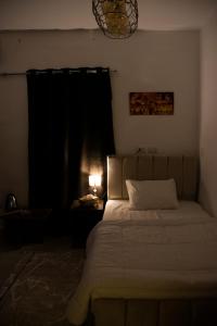 Letto o letti in una camera di Keeper Pyramids View INN