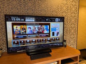 TV a/nebo společenská místnost v ubytování ホテルホワイトシティ23Adults only