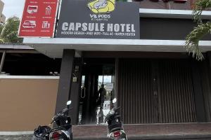 a motorcycle parked in front of a building at VK Pods Pangandaran in Pangandaran