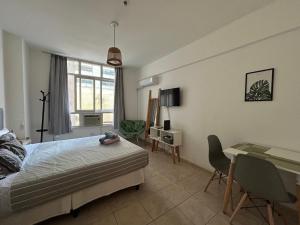 Postel nebo postele na pokoji v ubytování Maipu Apartment Studio