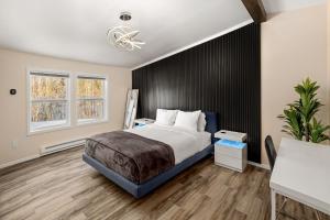 Ένα ή περισσότερα κρεβάτια σε δωμάτιο στο Modern Private Stay with Luxury Amenities