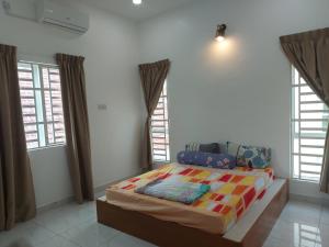 Fotografie z fotogalerie ubytování Comfort homestay68 v destinaci Sitiawan + 30 fotografií