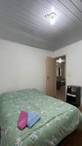 Postel nebo postele na pokoji v ubytování Casa Ilha