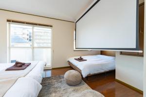Letto o letti in una camera di Vivere
