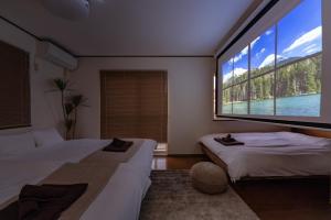 Letto o letti in una camera di Vivere