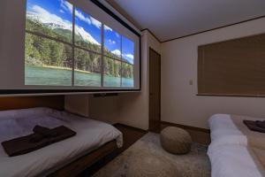 Letto o letti in una camera di Vivere