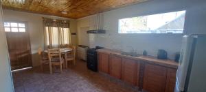 Køkken eller tekøkken på Cabaña La Cruz del Sur