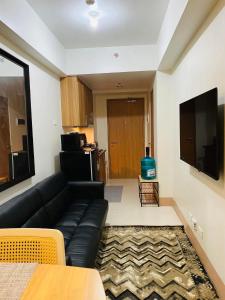 TV a/nebo společenská místnost v ubytování SMDC Shore 3 Residences