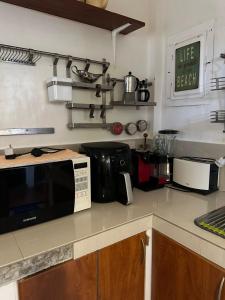 Kuchyň nebo kuchyňský kout v ubytování Villa Naatang Bohol Beach House 1