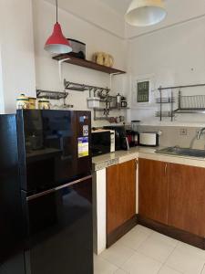 Kuchyň nebo kuchyňský kout v ubytování Villa Naatang Bohol Beach House 1