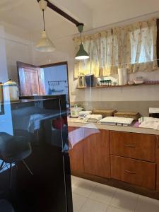 Kuchyň nebo kuchyňský kout v ubytování Villa Naatang Bohol Beach House 1