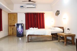 A bed or beds in a room at REST POINT GUEST HOUSE AND APPARTMNTs