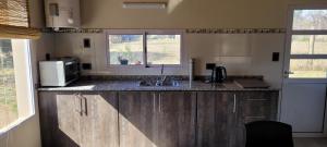 Kuchyň nebo kuchyňský kout v ubytování La Sietecolores