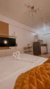 Ένα ή περισσότερα κρεβάτια σε δωμάτιο στο Angel's Haven Staycation +9 φωτογραφίες