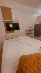 Ένα ή περισσότερα κρεβάτια σε δωμάτιο στο Angel's Haven Staycation