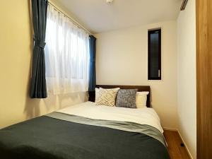 Ένα ή περισσότερα κρεβάτια σε δωμάτιο στο Casa Stella 8 by Liaison