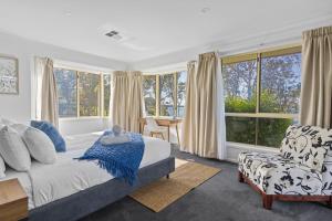 Ένα ή περισσότερα κρεβάτια σε δωμάτιο στο Waterfront Paradise Lodge Brightwaters +25 φωτογραφίες