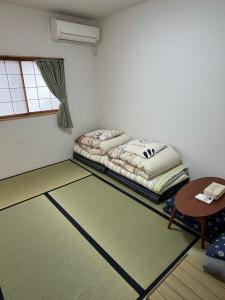 Χώρος καθιστικού στο Kanazawa Guesthouse Stella