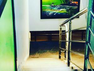 TV a/nebo společenská místnost v ubytování 3D SUITES N LOUNGe