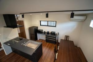 an overhead view of a kitchen and dining room at Takinoyu House in Nozawa Onsen