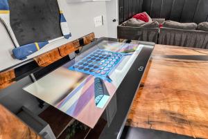 a table with a computer keyboard on top of it at Ocean Lakes Walk to beach! Waterpark! Arcade! Dogs Welcome! in Myrtle Beach