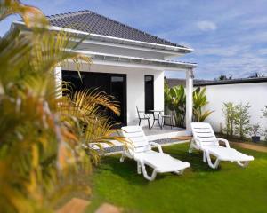 Κήπος έξω από το Villa et Bungalow Baan Joan Khao Lak