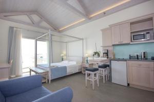 Kuchyň nebo kuchyňský kout v ubytování Thalassa Suites