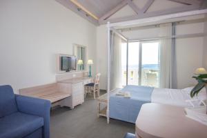 TV a/nebo společenská místnost v ubytování Thalassa Suites