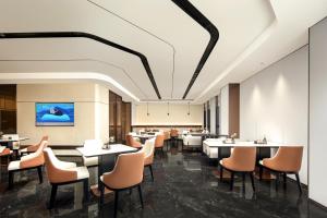 Posezení v ubytování Atour Hotel Wuxi Taikeyuan Zhenze Road