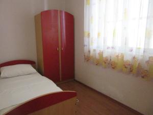 Posteľ alebo postele v izbe v ubytovaní Petar Apartments