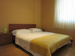 Posteľ alebo postele v izbe v ubytovaní Petar Apartments