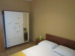 Posteľ alebo postele v izbe v ubytovaní Petar Apartments
