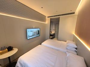 Imagen de la galería de Anger Executive Hotel Shanghai New International Expo Center Yuhe Silicon Valley Branch, en Shanghái
