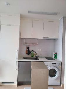 Kuchyň nebo kuchyňský kout v ubytování KM Home