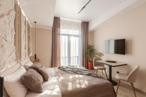 TV a/nebo společenská místnost v ubytování ACCENT Apart-Hotel