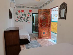 Postel nebo postele na pokoji v ubytování Riad Safir Fes Deluxe