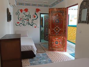 Postel nebo postele na pokoji v ubytování Riad Safir Fes Deluxe