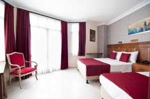 Postel nebo postele na pokoji v ubytování Artefes Hotel Old City