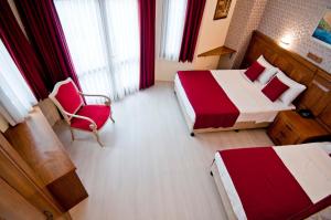 Postel nebo postele na pokoji v ubytování Artefes Hotel Old City