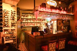 a bar in a restaurant with a lot of alcohol at Lokka Hotel Ortakoy in Istanbul