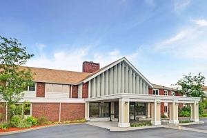 a rendering of the front of a building at Ramada by Wyndham Seekonk Providence Area in Seekonk