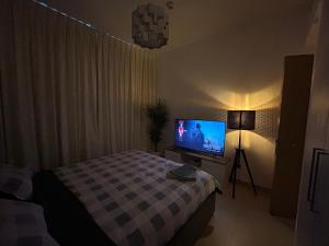 Shared Apartment In Dubai Hills客房内的一张或多张床位