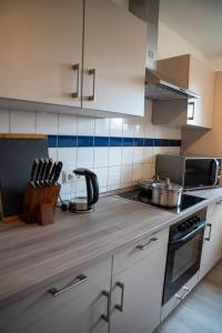 Η κουζίνα ή μικρή κουζίνα στο Stilvoll Apt - Balkon - Netflix +35 φωτογραφίες