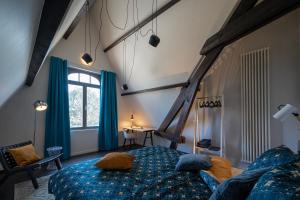 Postel nebo postele na pokoji v ubytování B&B Het Havenhuis