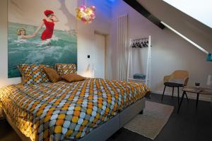 Postel nebo postele na pokoji v ubytování B&B Het Havenhuis